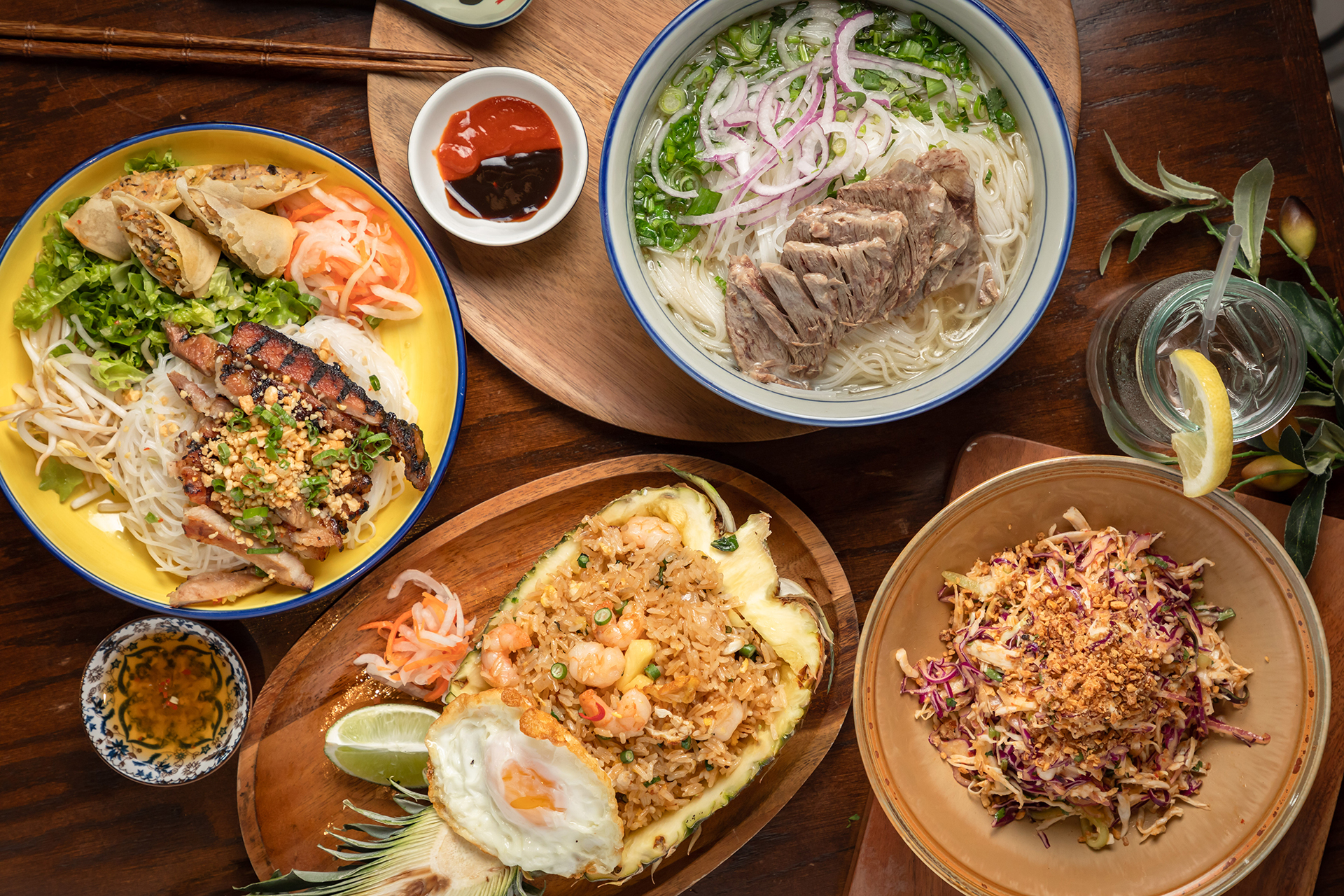 Súp Vietnamese dishes arranged on a table